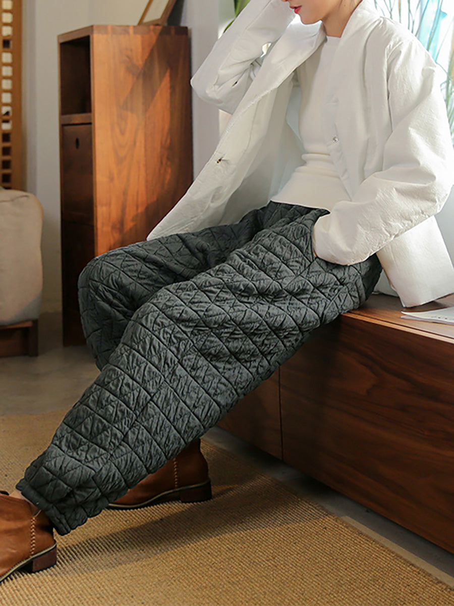 Pantaloni lanterna con elastico in vita e tasca in tinta unita e caldi