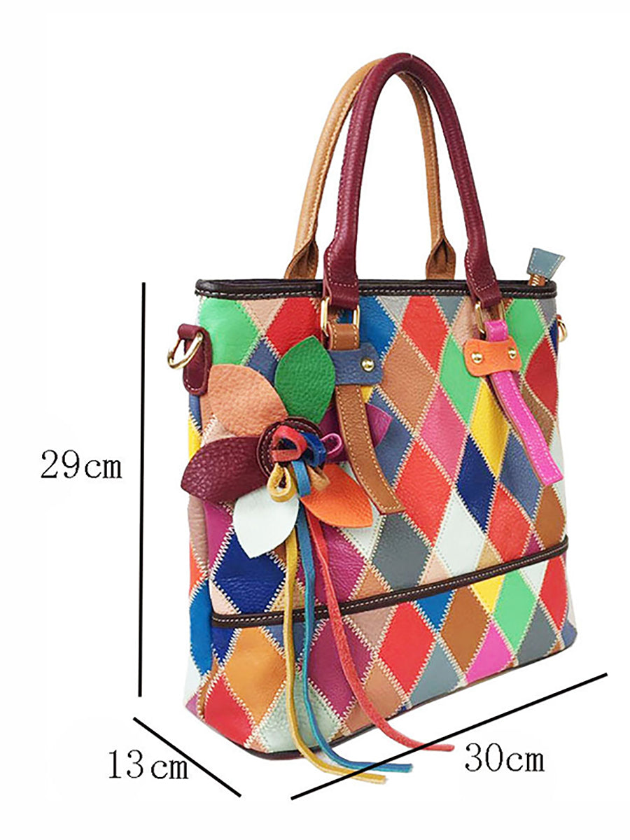 Borsa a mano da donna in pelle con fiore a contrasto di colore