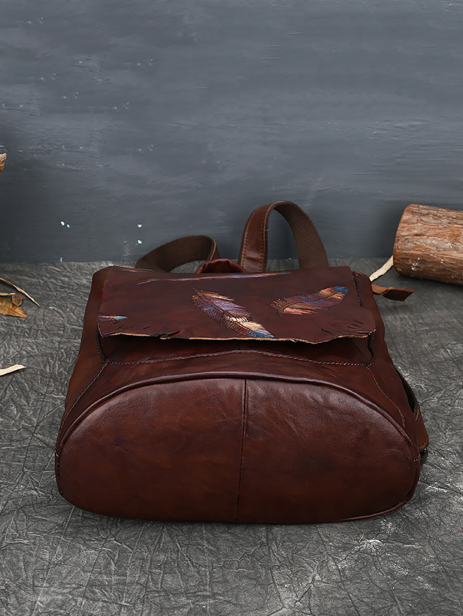 Zaino da donna in pelle vintage con stampa a piume