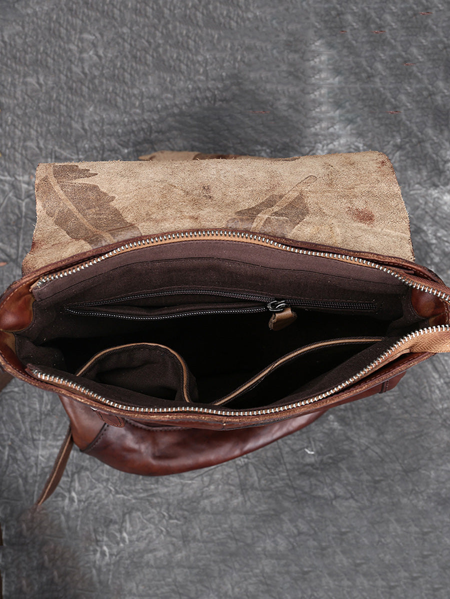 Zaino da donna in pelle vintage con stampa a piume