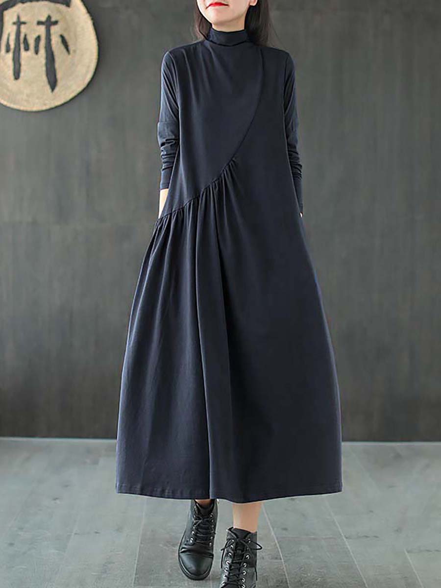 Robe à col montant drapée de couleur unie