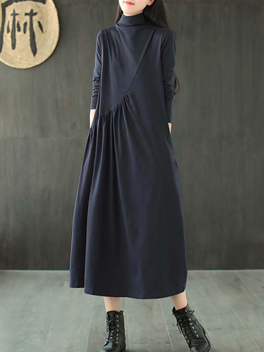 Robe à col montant drapée de couleur unie