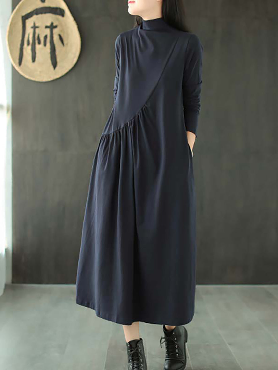 Robe à col montant drapée de couleur unie