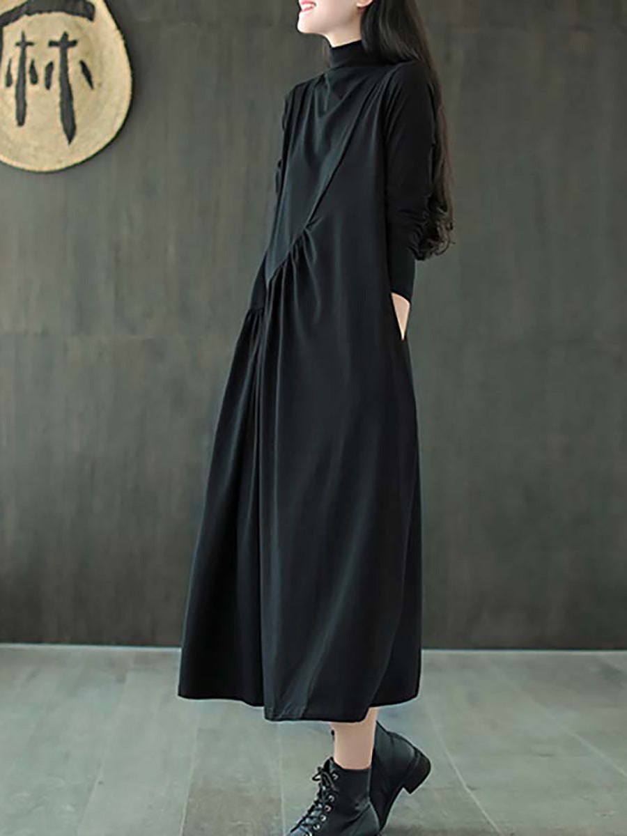 Robe à col montant drapée de couleur unie