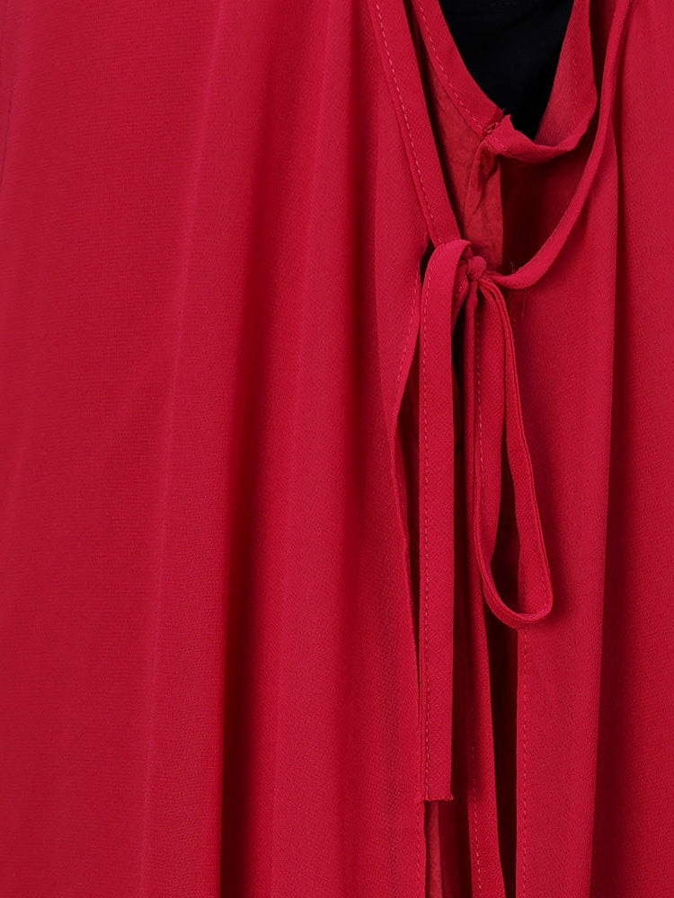 Abito estivo da donna con orlo irregolare e gilet ampio e solido