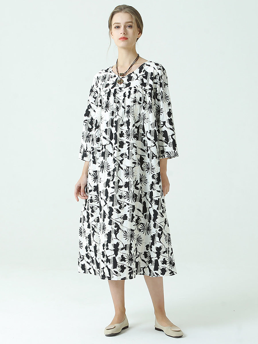 Robe plissée à manches longues et col rond avec imprimé floral