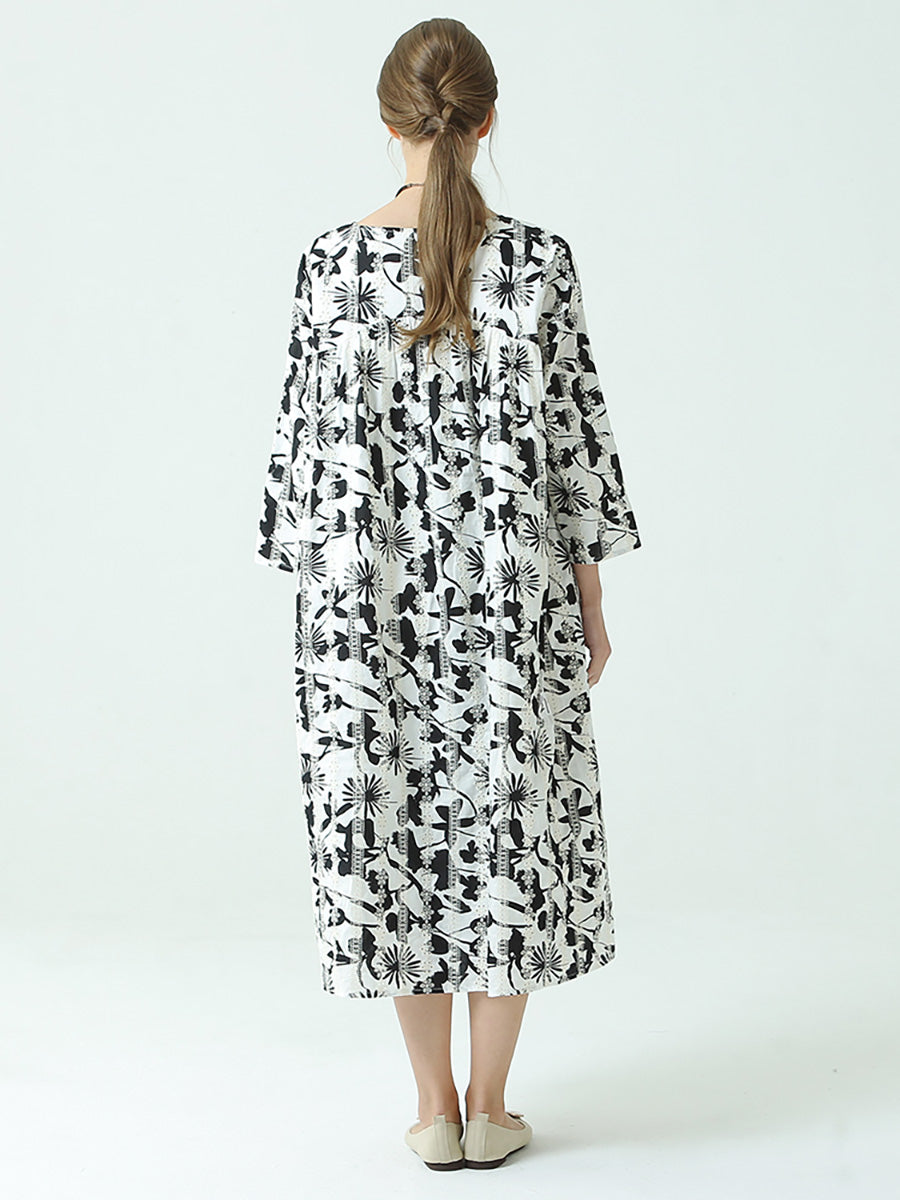 Robe plissée à manches longues et col rond avec imprimé floral