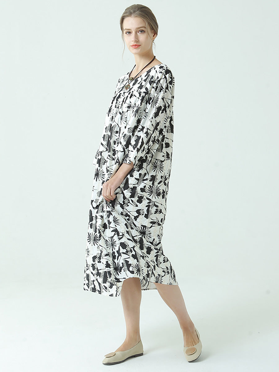 Robe plissée à manches longues et col rond avec imprimé floral