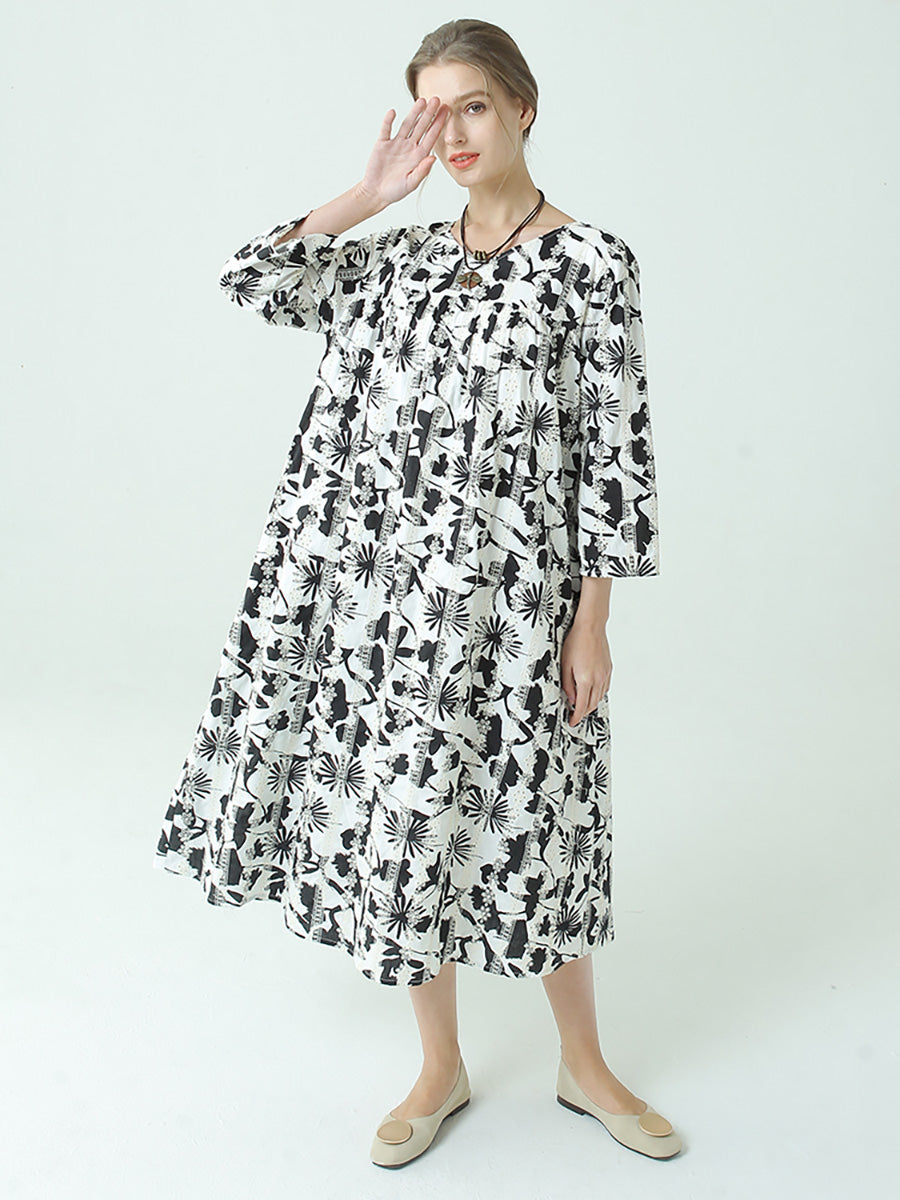 Robe plissée à manches longues et col rond avec imprimé floral