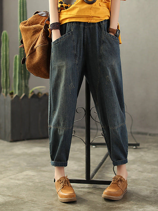 Jeans vintage in denim strappato con elastico in vita e cuciture
