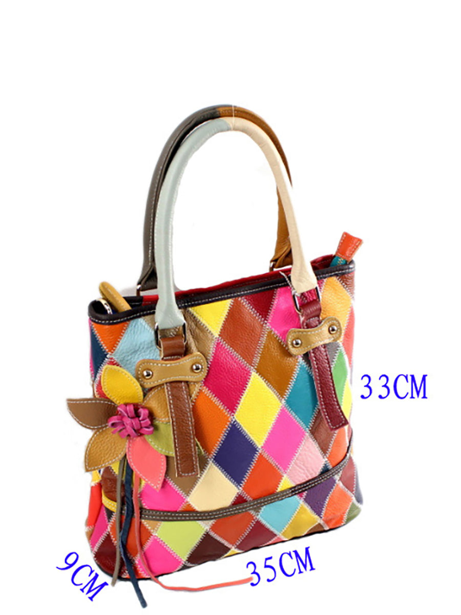 Borsa a mano da donna in pelle con fiore a contrasto di colore