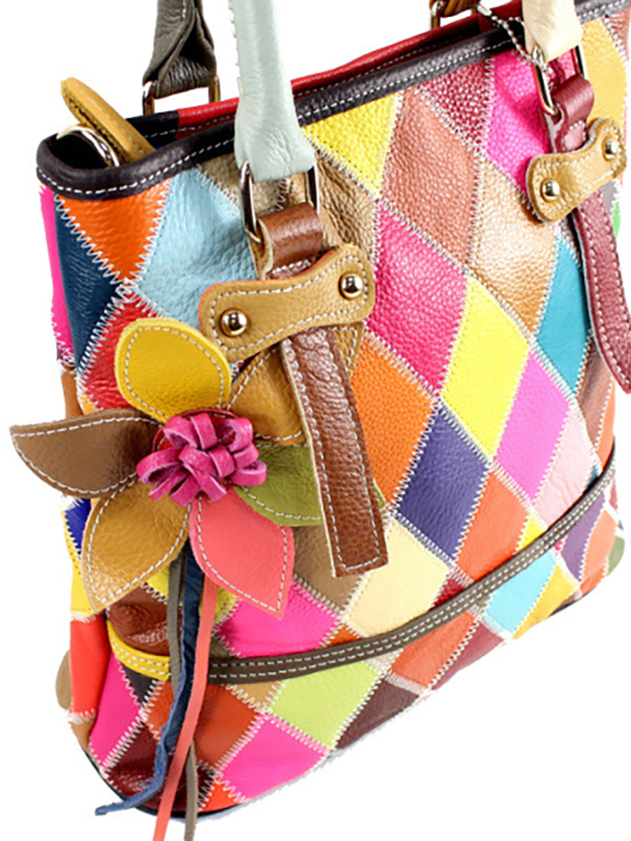 Borsa a mano da donna in pelle con fiore a contrasto di colore