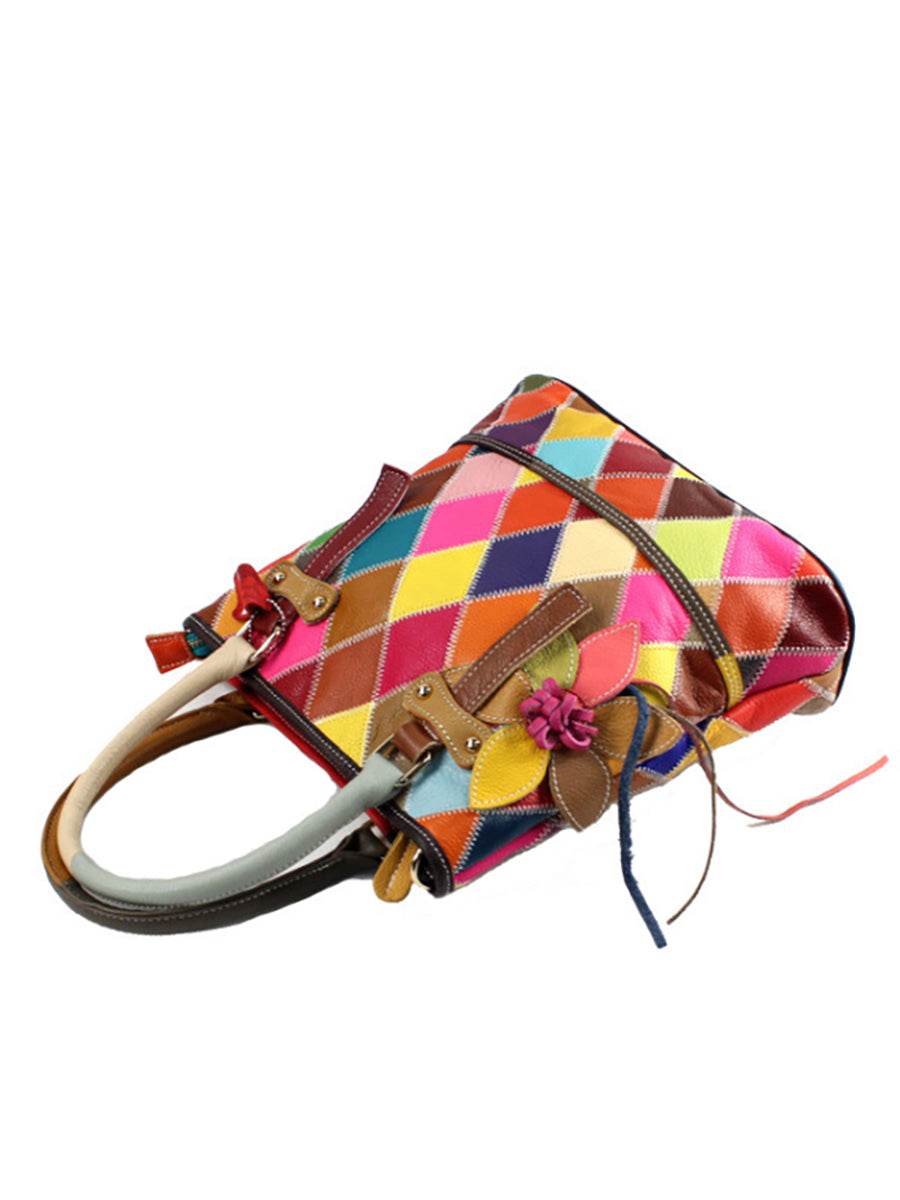 Borsa a mano da donna in pelle con fiore a contrasto di colore