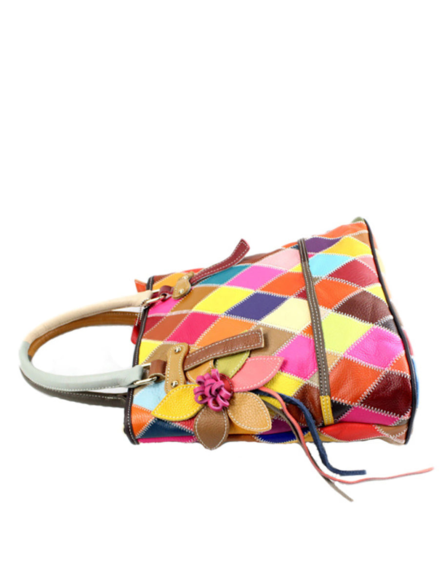 Borsa a mano da donna in pelle con fiore a contrasto di colore